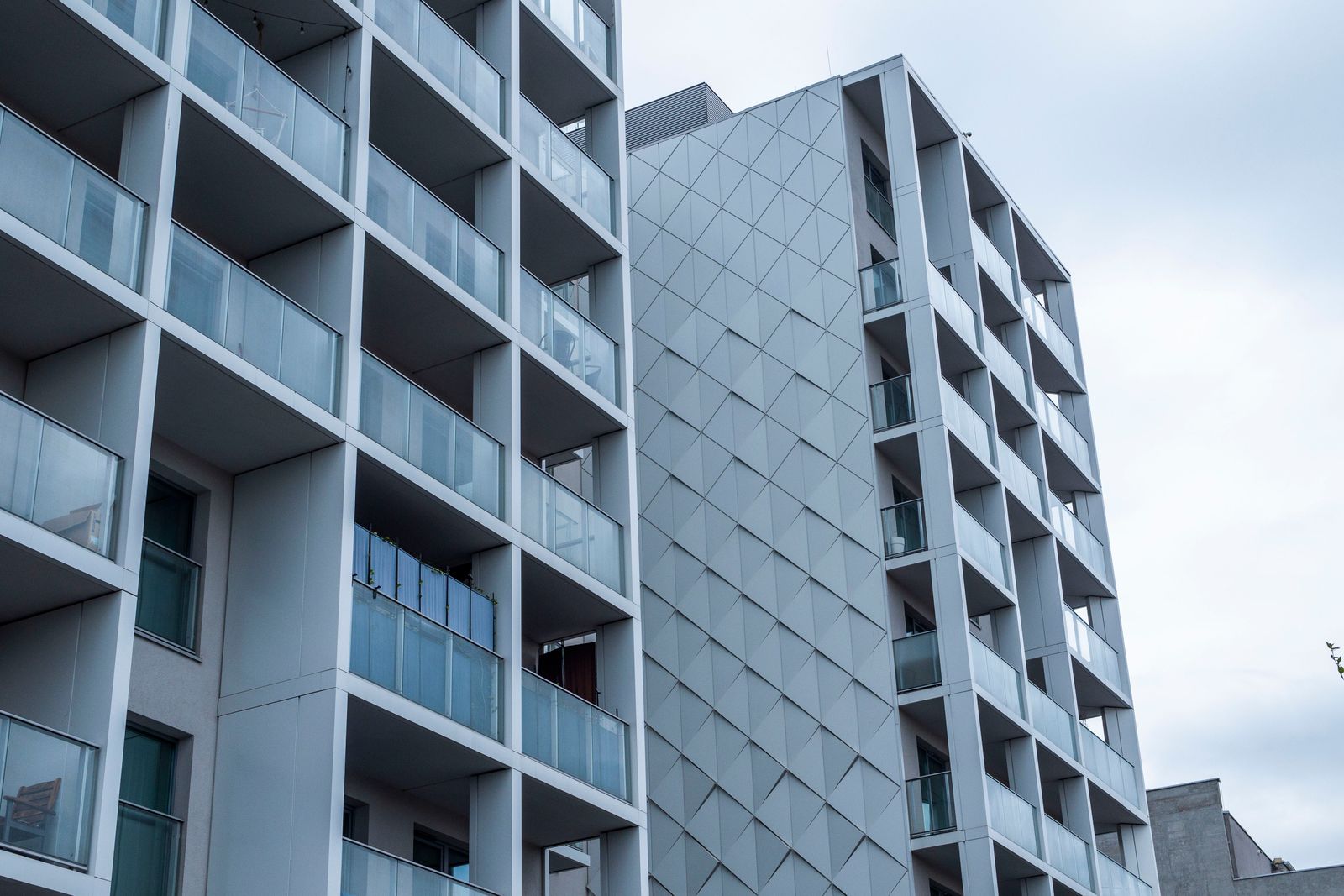 Balconies and the exterior of an apartment building, illustrating strata ownership.